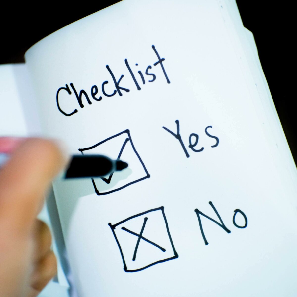 Handwritten checklist with yes and no checkboxes