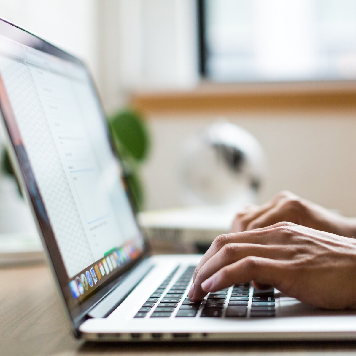 Person working on keyboard