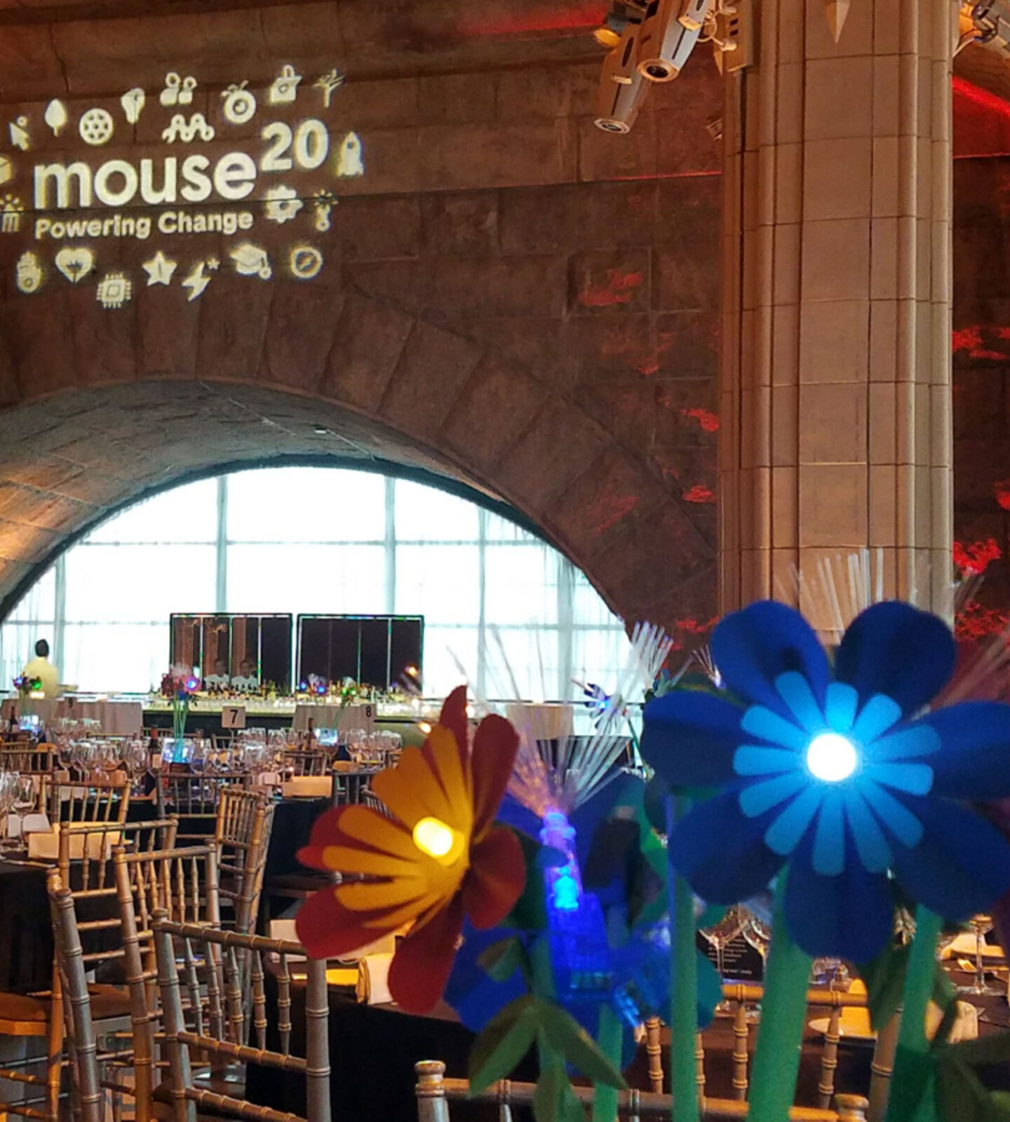 Tables with led flowers as centerpieces for youth focused technology nonprofit gala
