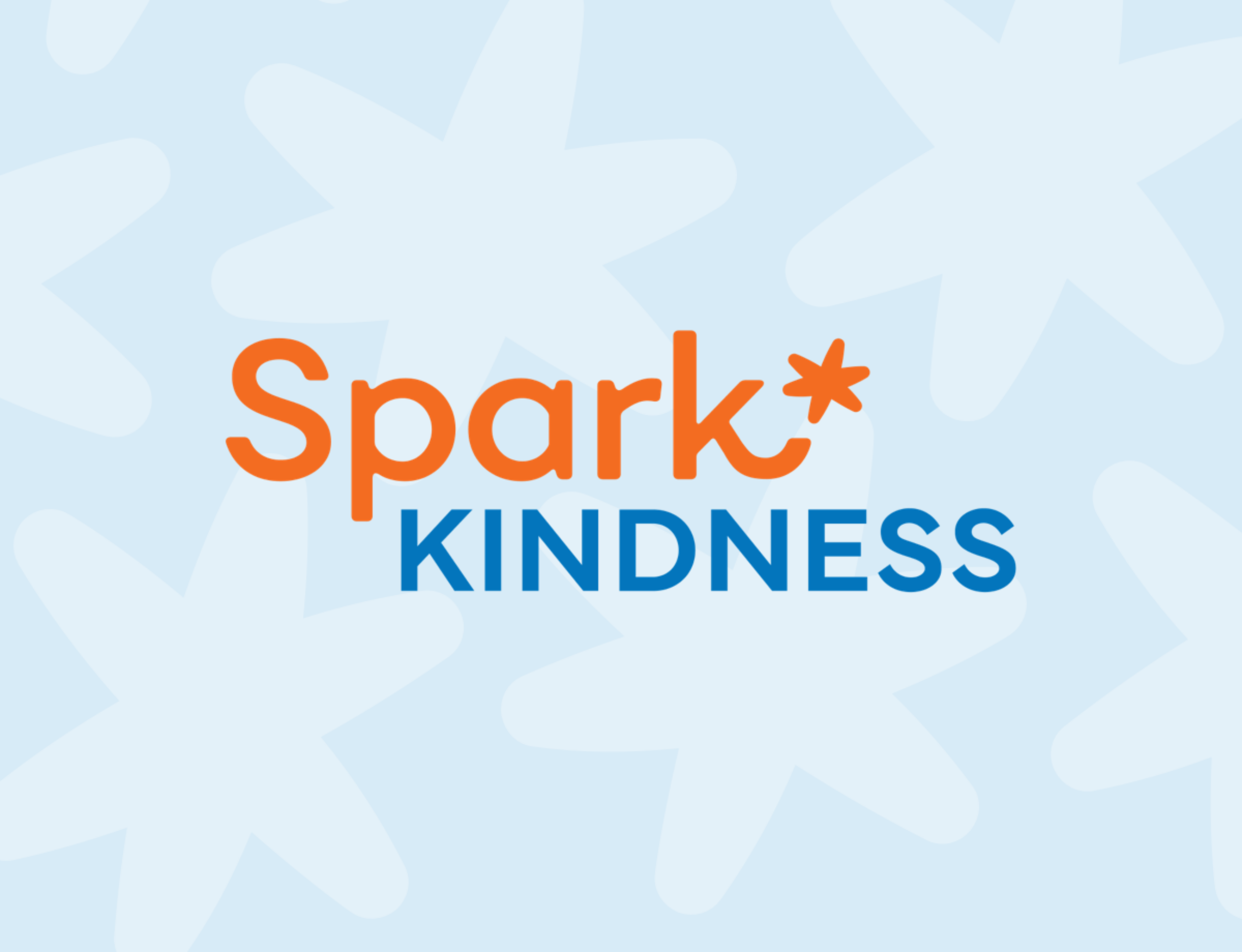Spark Kindness logo featuring 'Spark' in orange text with an asterisk-like symbol as the Spark and 'KINDNESS' in blue text below